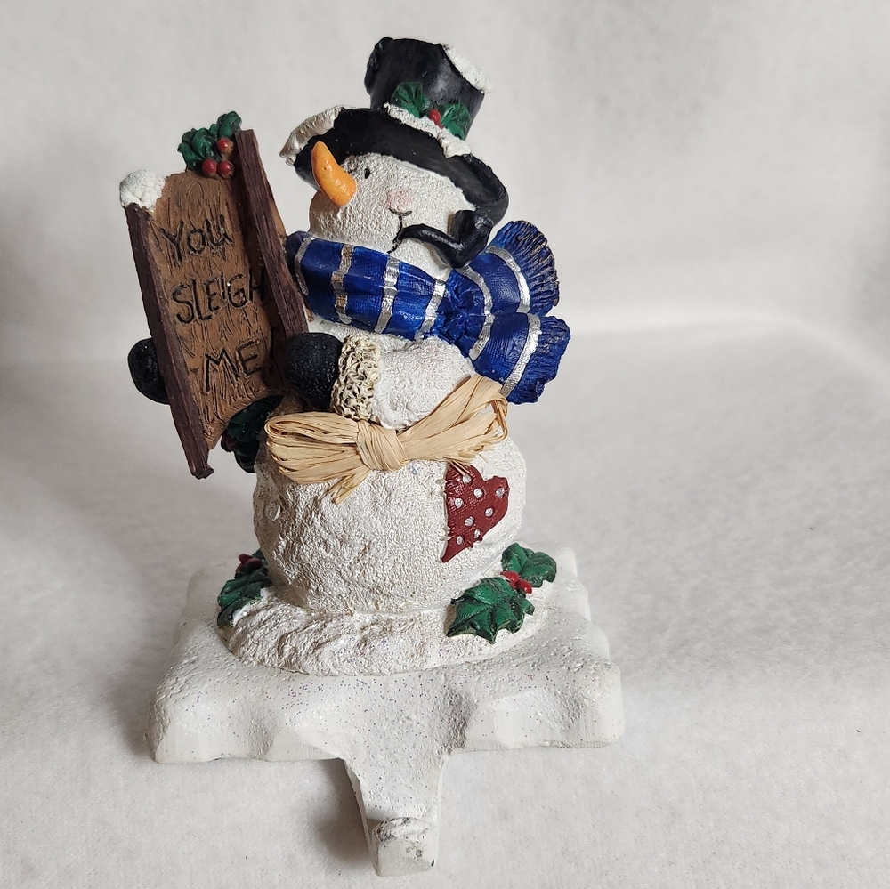 Weighted Snowman Stocking Holder Standing On A Snow-Covered Base Playful Vibe